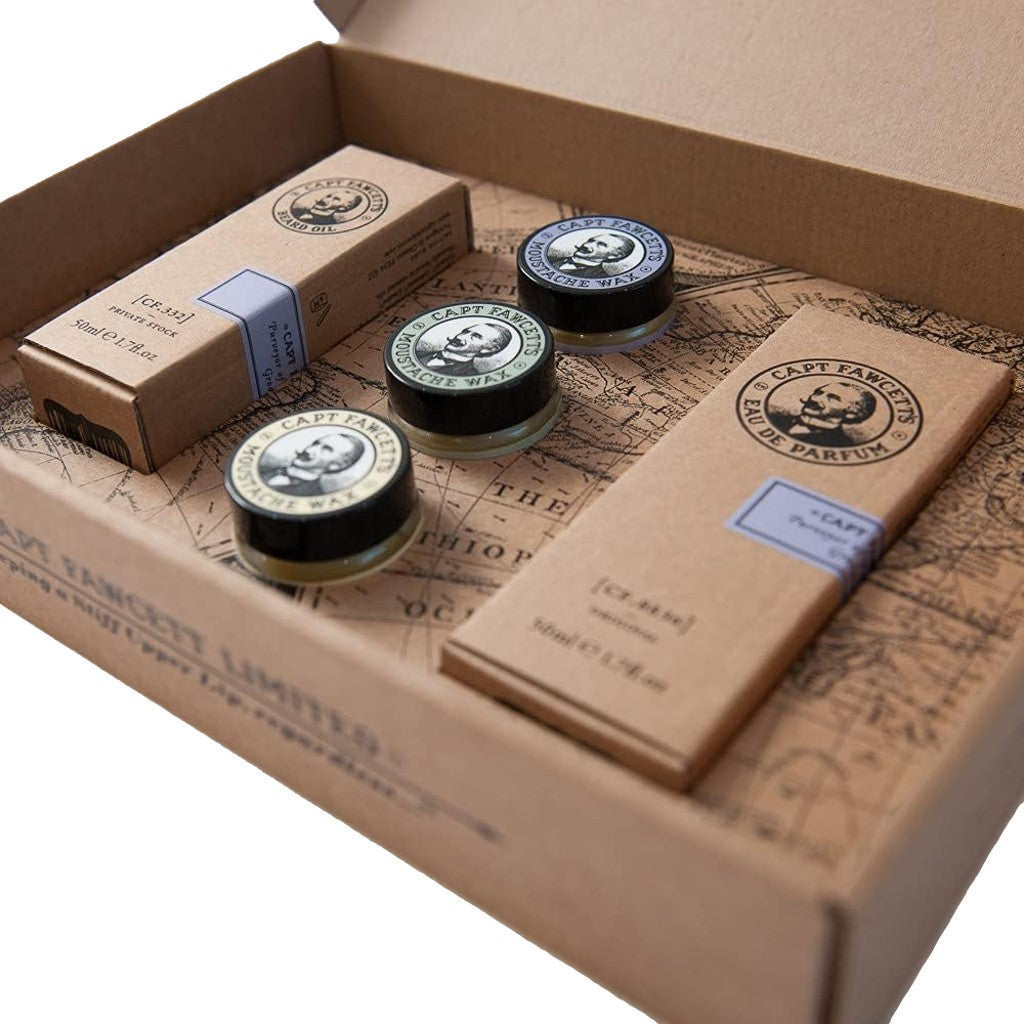 Set of Cap't. Fawcett products in a cardboard box with a map design