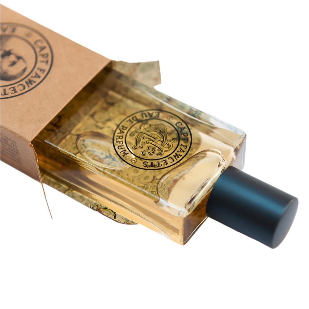 Perfume bottle with brown packaging featuring a logo on a white background