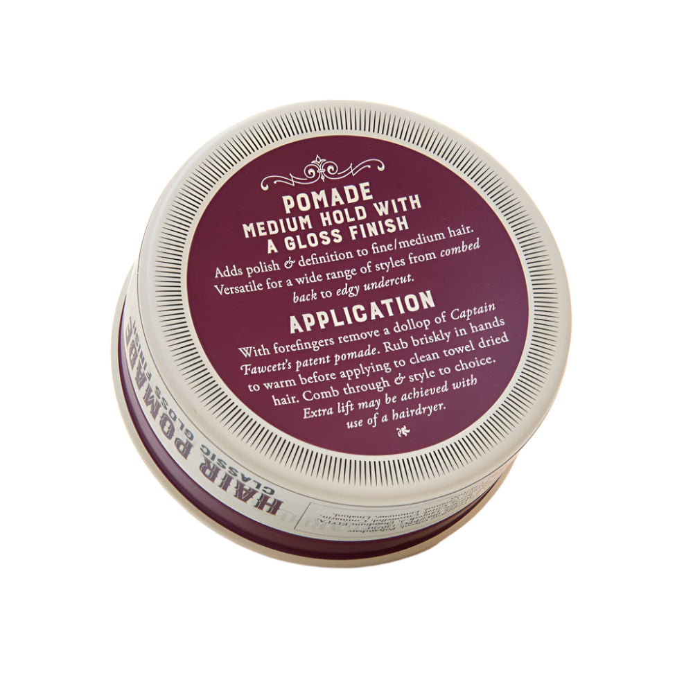 Jar of hair pomade with purple label on a white background