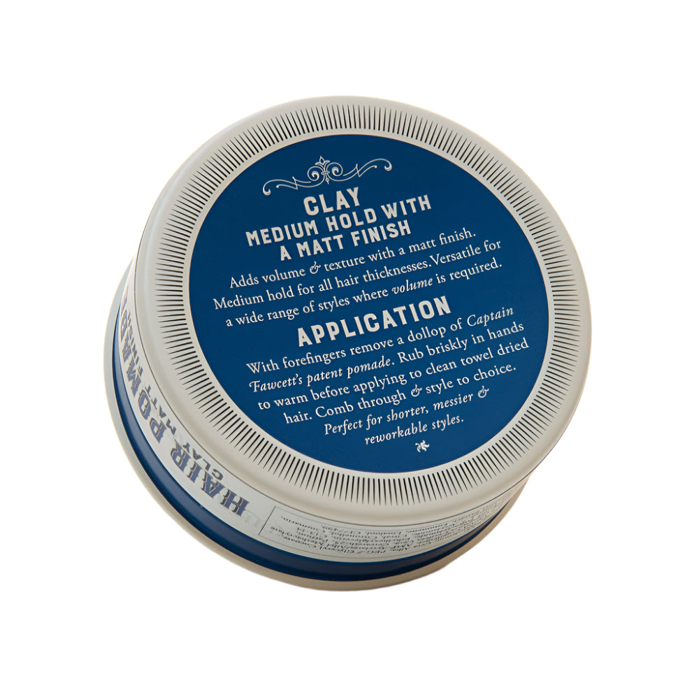 Container of hair clay with blue label on a white background