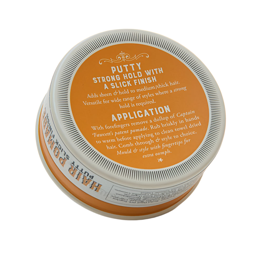 Jar of hair putty with orange label on a white background