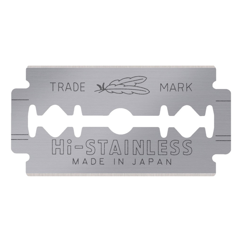 Close-up view of a Feather Hi-Stainless double-edge razor blade made in Japan.