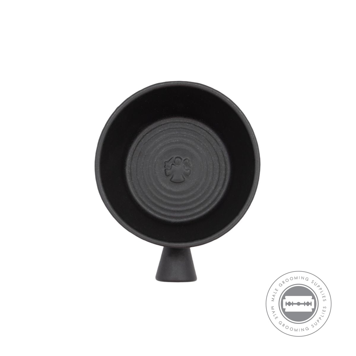 Top view of the ceramic lathering bowl from the Dovo Shave Ritual Set in Pitch Dark, designed with a textured base.
