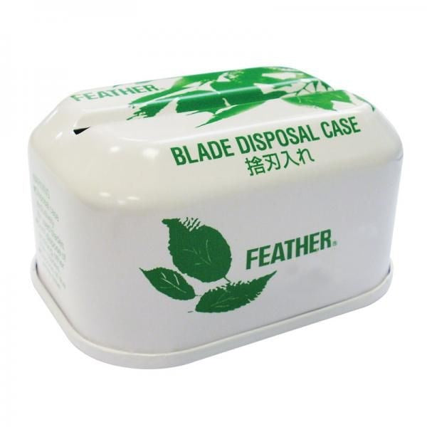 Feather Blade Disposal Case showcasing its compact design with green leaf illustrations and text for safe disposal of razor blades.