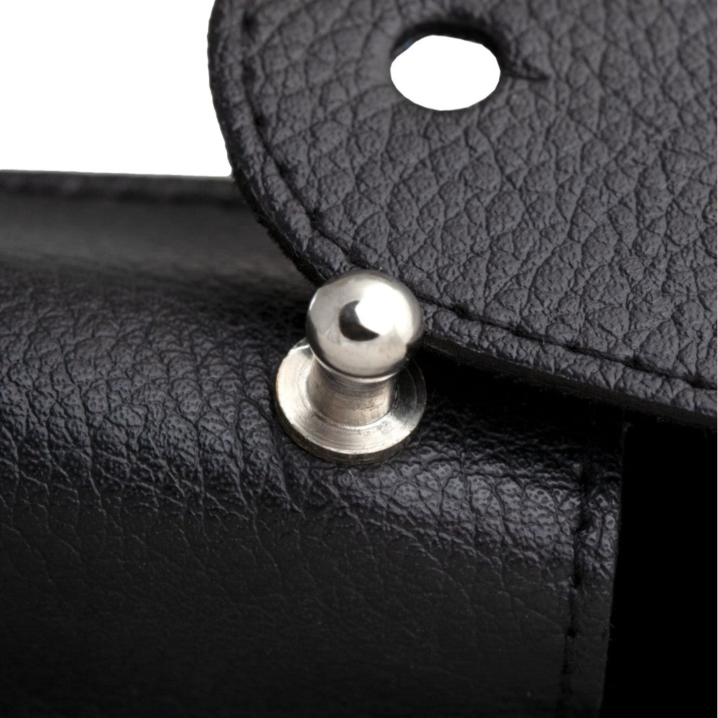 Close-up of silver button closure on Giesen & Forsthoff Straight Razor Case.