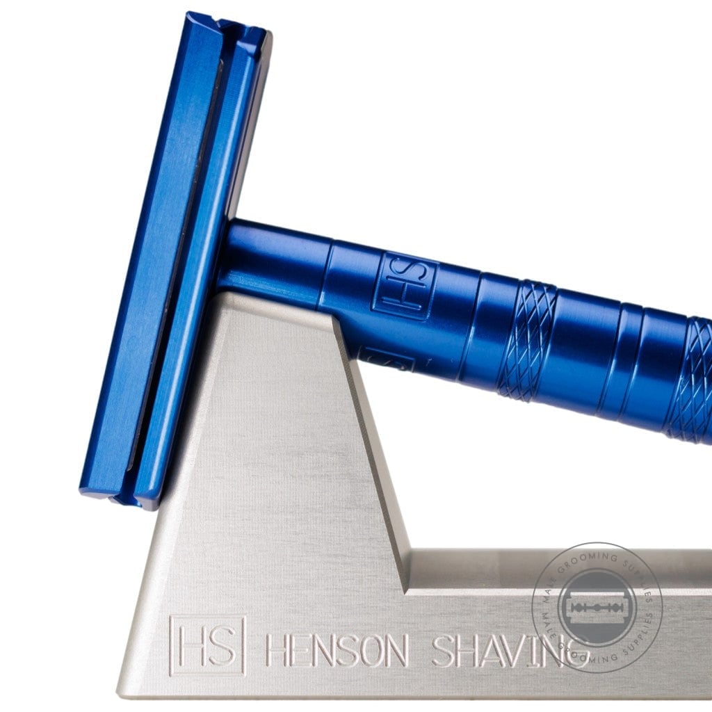 Henson Shaving Razor Stand with a blue Henson AL13 Safety Razor, showcasing a modern aesthetic.