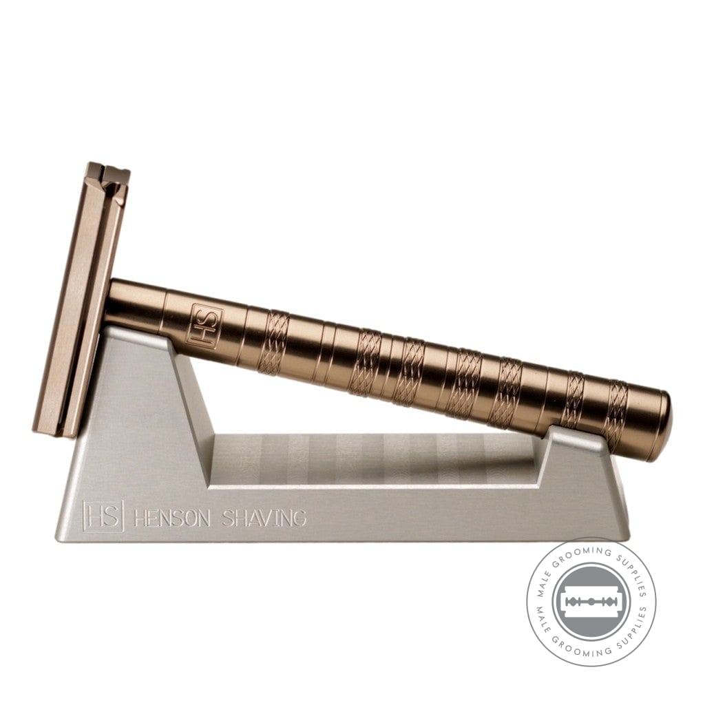 Henson Razor Stand with a tan Henson AL13 Razor, highlighting the compact and elegant design for bathroom display.