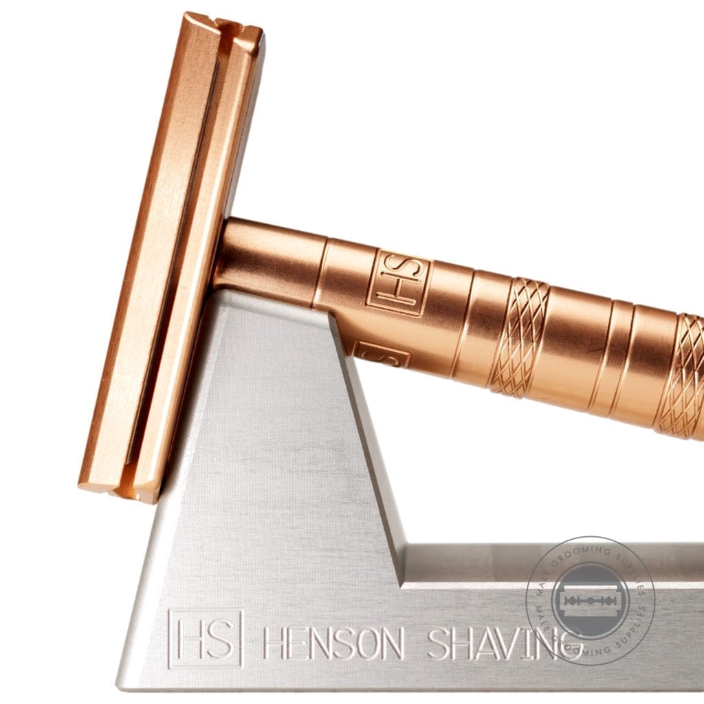 Henson Shaving Razor Stand featuring a copper Henson AL13 Safety Razor in a striking finish.