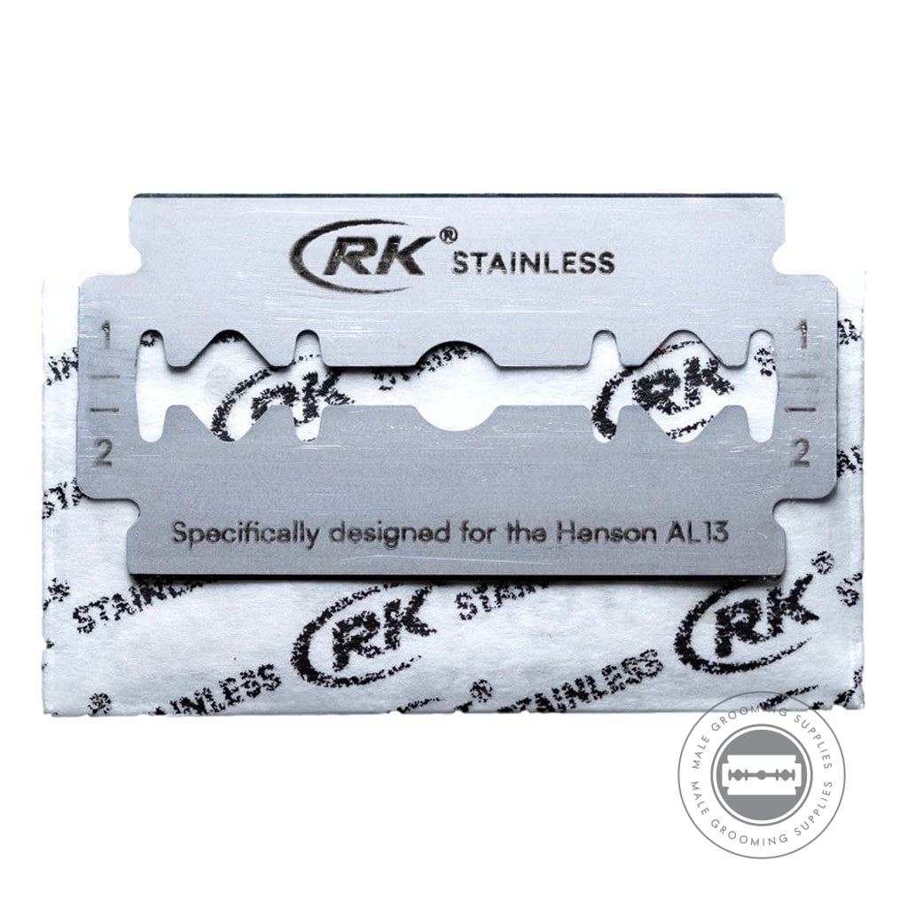 Close-up view of an RK stainless steel double-edge razor blade, compatible with Henson AL13.