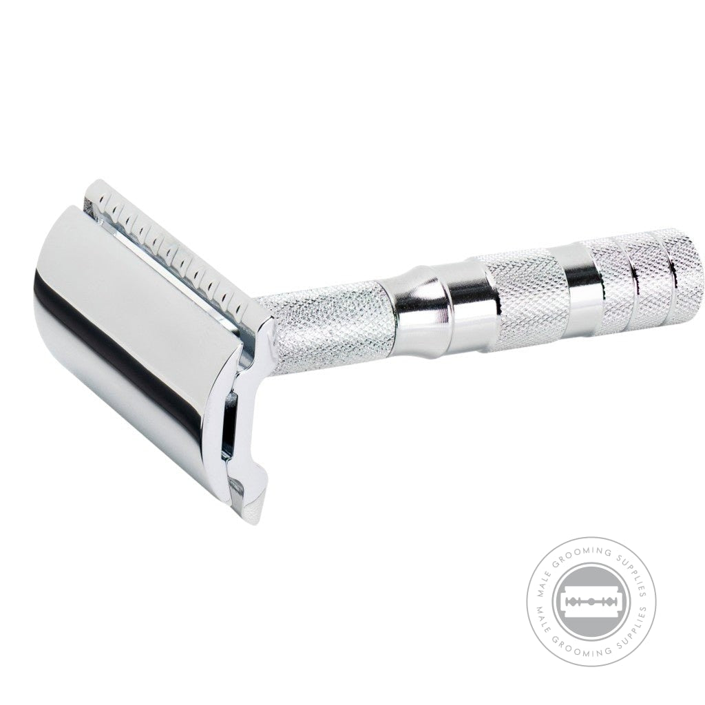 Front view of the Merkur Closed Comb Travel Razor 933000 with bright chrome finish and textured handle for a secure grip.