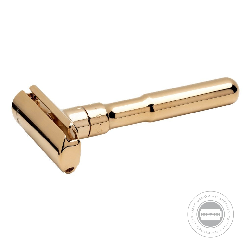 Merkur FUTUR Gold Plated Razor 702003 angled side view, showcasing the 24k gold-plated finish and adjustable blade gap.