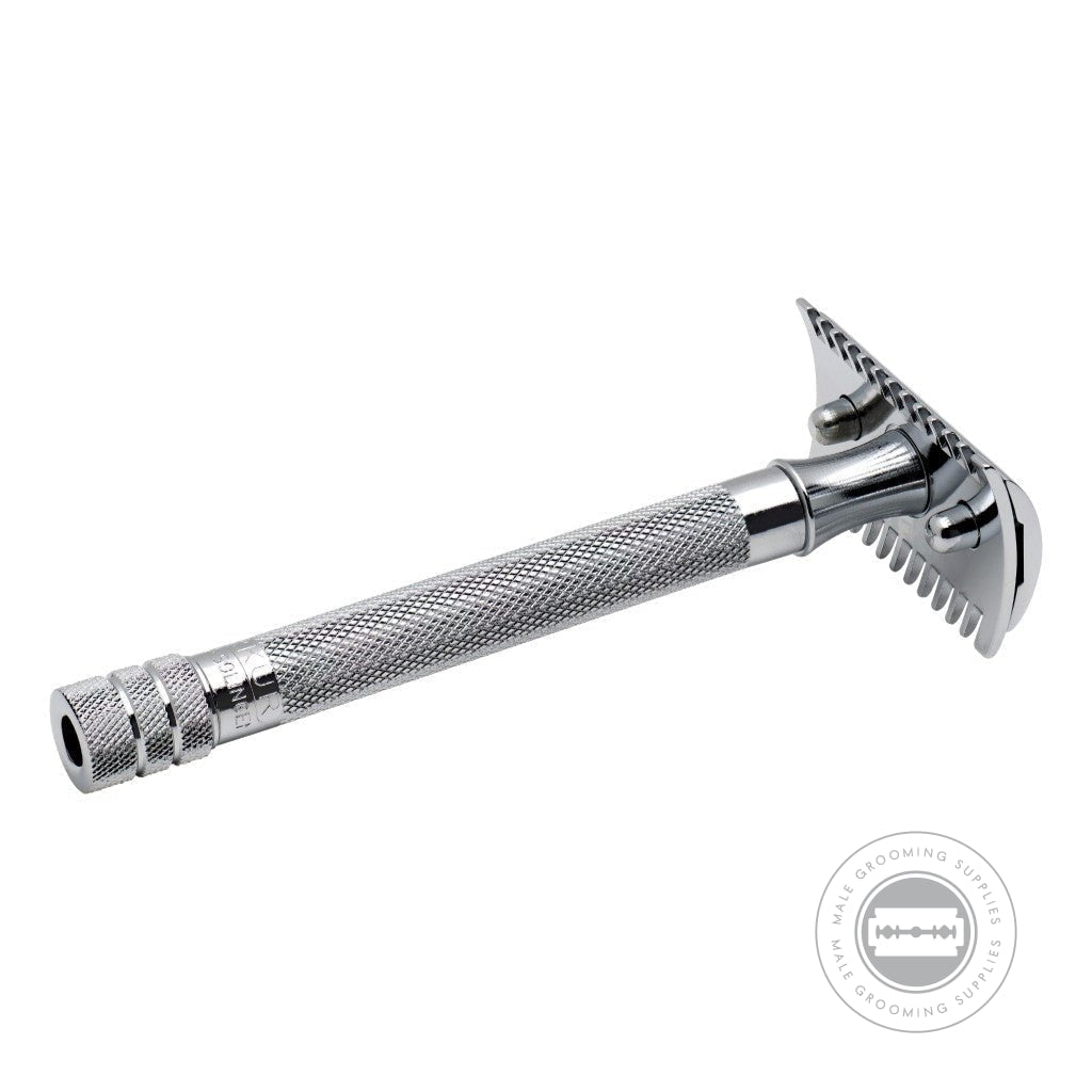 Side view of Merkur Long Handled Open Comb Double Edge Safety Razor 25001, showing the textured grip and sleek open comb head.
