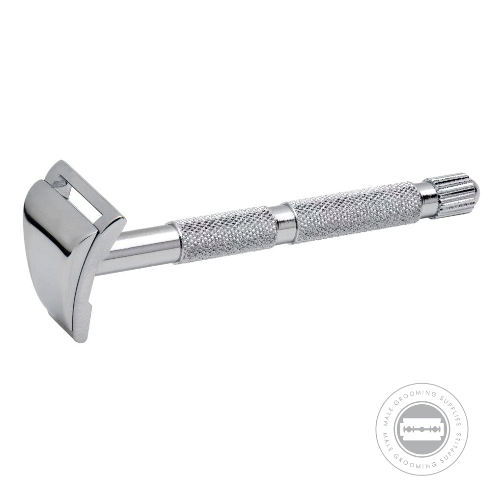 Merkur Mustache & Eyebrow Razor 907000 angled side view, showcasing the narrow blade and bright chrome finish for precision contouring.