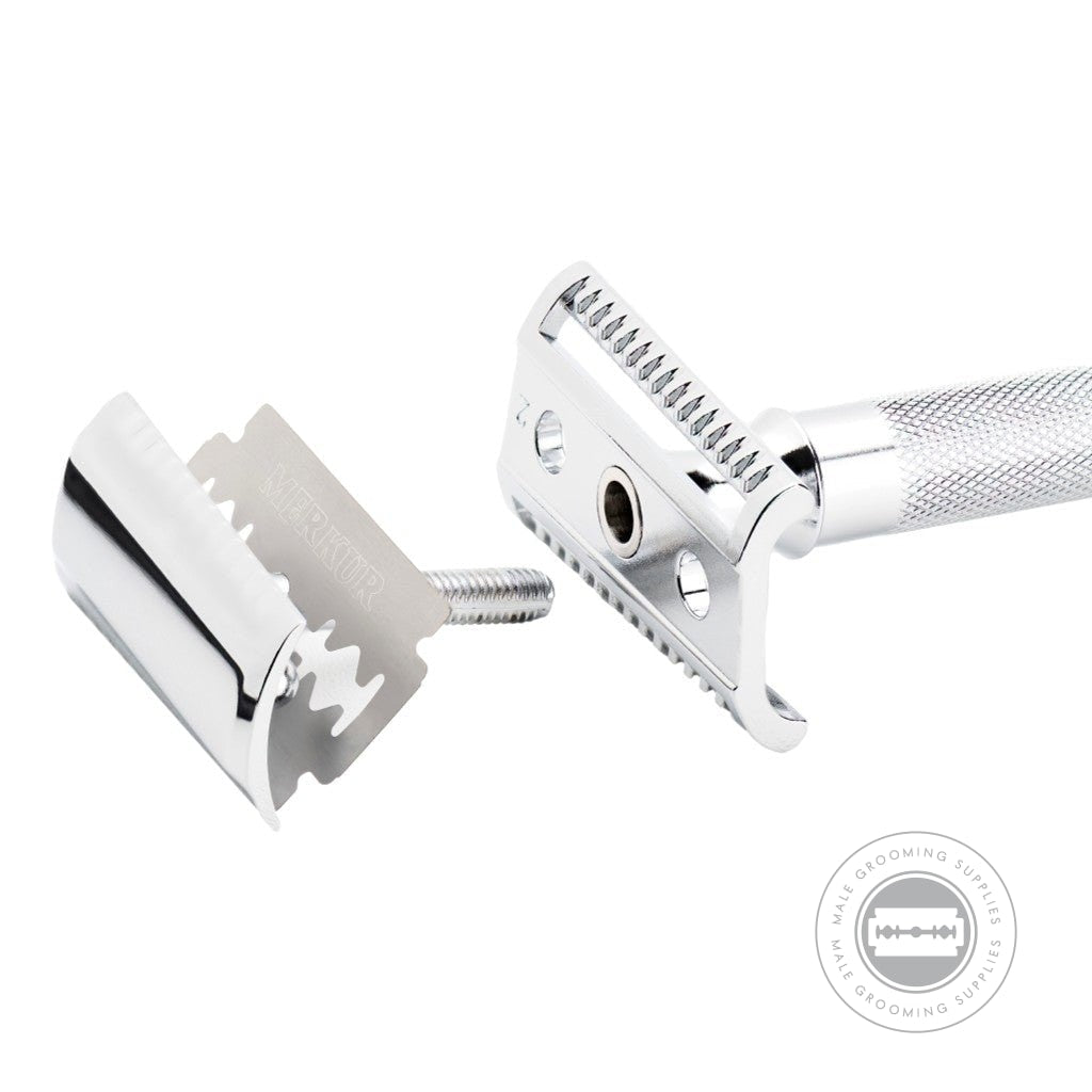 Disassembled Merkur 37C Slant Bar Safety Razor, showcasing the slant razor head, threaded post, and knurled handle for precise shaving control.