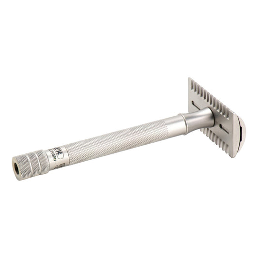 Underside angle of the Merkur 25 INOX showing the open comb teeth and satin handle.