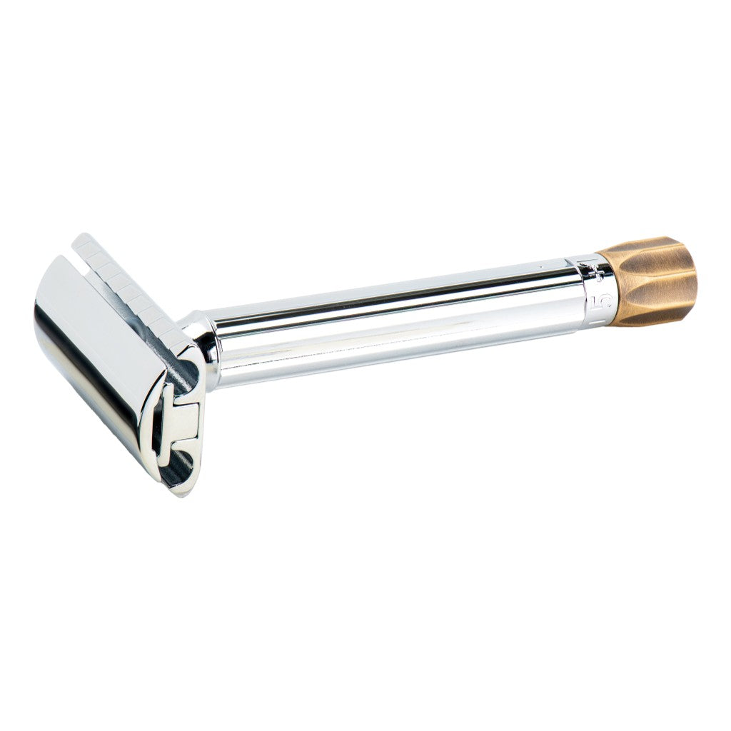 Angled view of the Merkur 510 Progress adjustable razor and closed comb head.
