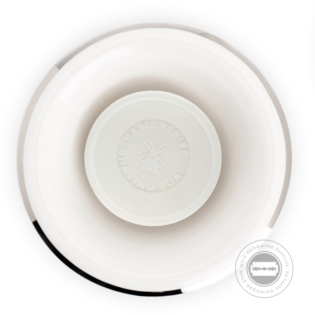 Top View of Muhle Porcelain White Shaving Bowl with Platinum Rim: An overhead view of the Muhle porcelain white shaving bowl, showcasing the small elevation at the center for keeping shaving soap dry. The platinum rim adds an elegant touch.