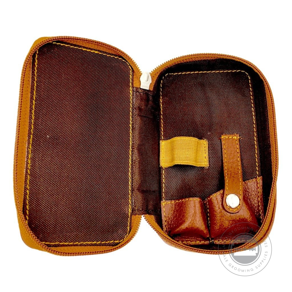 Interior view of Parker Leather Saddle Zip Case with compartments for razor and blades, saddle brown leather finish.