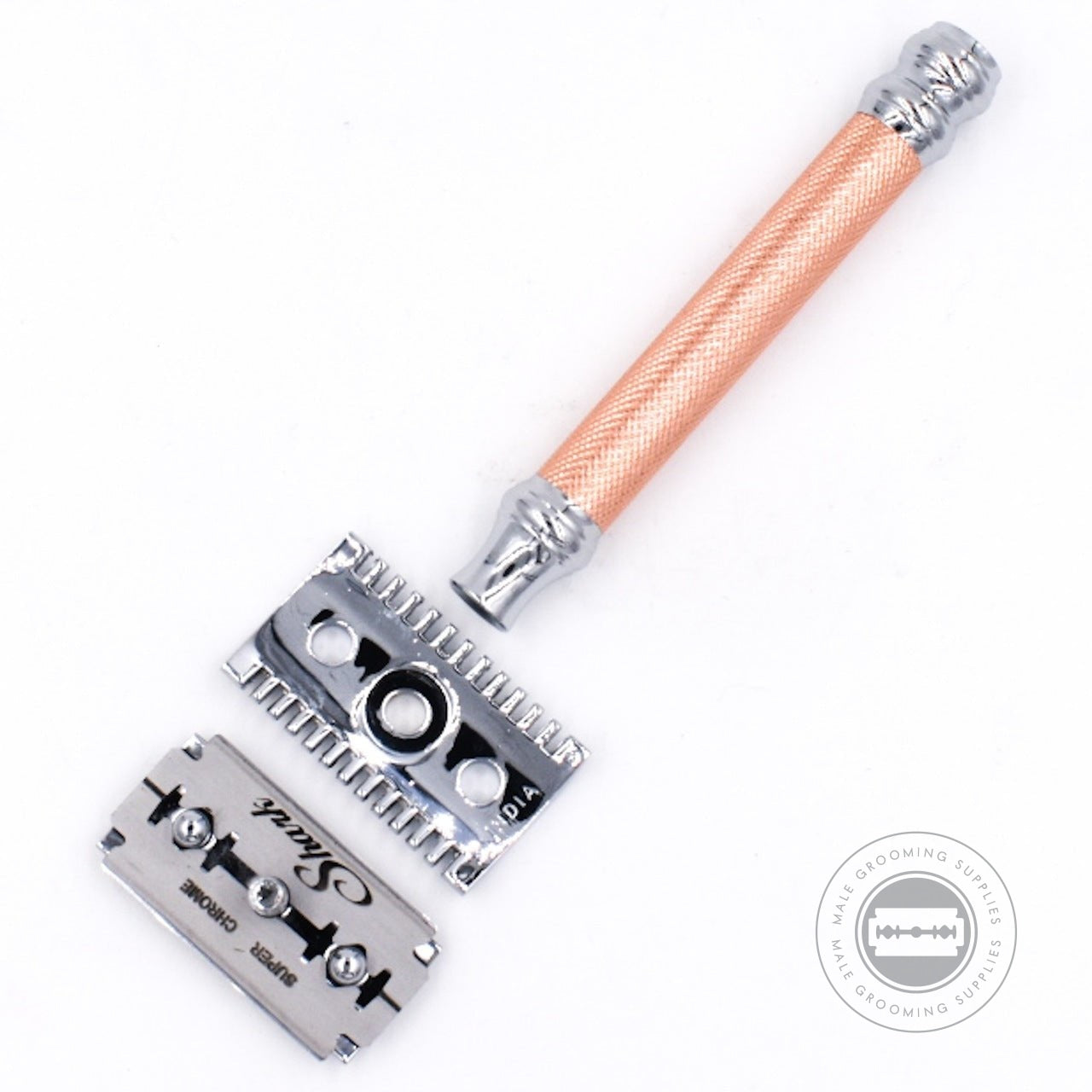 Disassembled Parker 63C Rose Gold Safety Razor showcasing its three-piece open comb design and elegant rose gold handle.