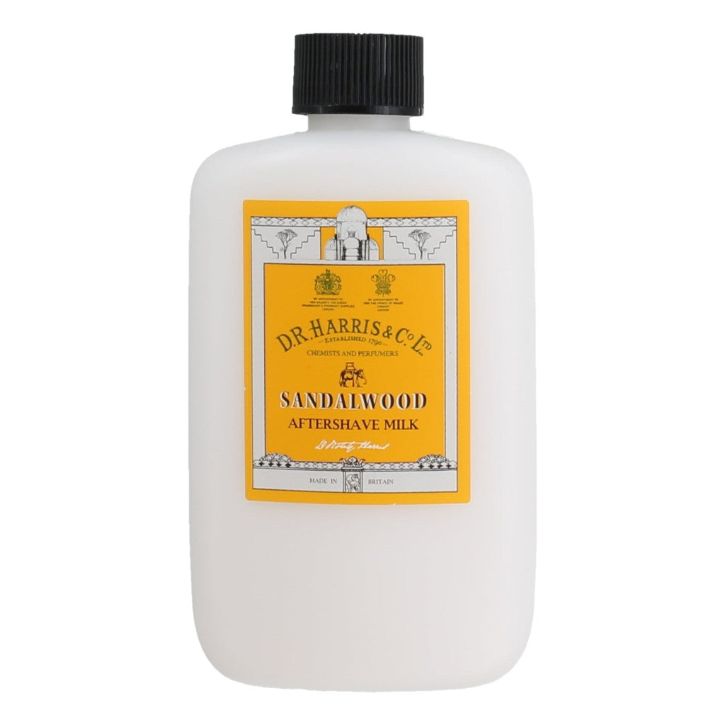 Bottle of Dr. Harris Sandalwood Aftershave Milk 100ml Plastic Bottle with a yellow label on a white background
