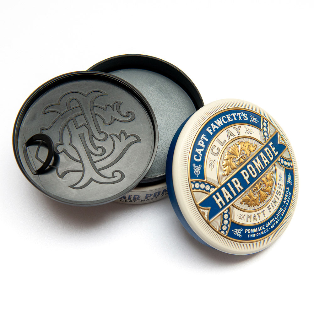 Capt Fawcett's Hair Pomade container with lid open on a white background