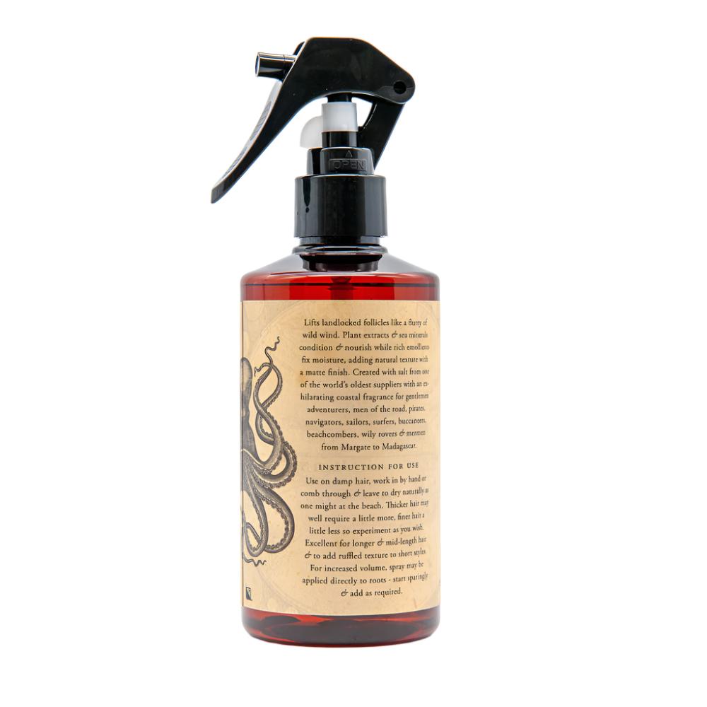 Spray bottle with a decorative label on a white background