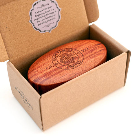 Wooden product in a cardboard box with 'Captain Fawcett' branding.
