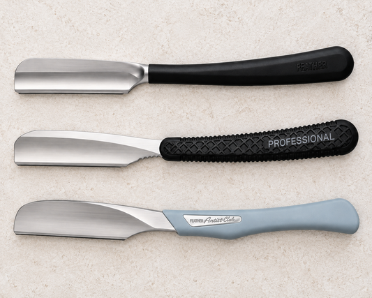 Feather Artist Club SS, SR and DX Japanese-style replaceable-blade razors arranged side by side