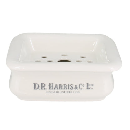 White ceramic soap dish with 'DR. HARRIS & CO.' branding on a white background