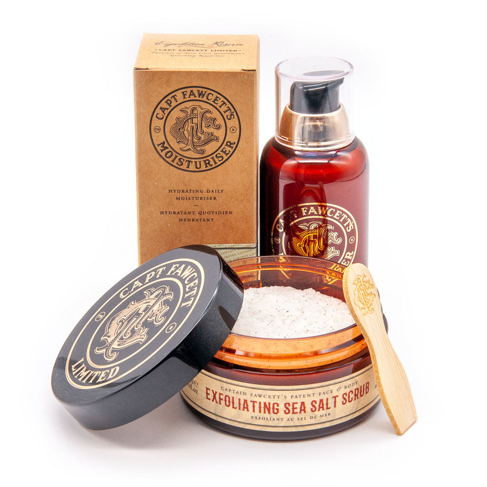 Captain Fawcett Exfoliating Scrub and Moisturiser Set in two tubes with branding and sea breeze inspiration. Open.