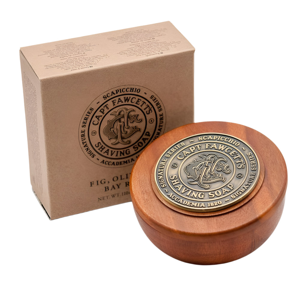 Wooden shaving soap bowl with metal cap and cardboard box featuring Captain Fawcett's branding on a white background.