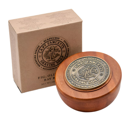 Wooden shaving soap bowl with metal cap and cardboard box featuring Captain Fawcett's branding on a white background.