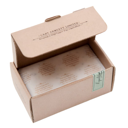 Open cardboard box with a label and text on a white background