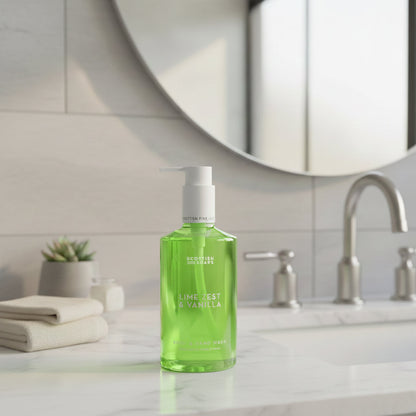 Green Lime Zest & Vanilla Body & Hand Wash bottle beside a bathroom basin and mirror