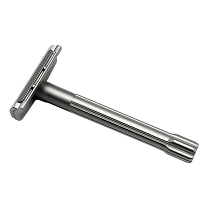 Silver safety razor on a white background