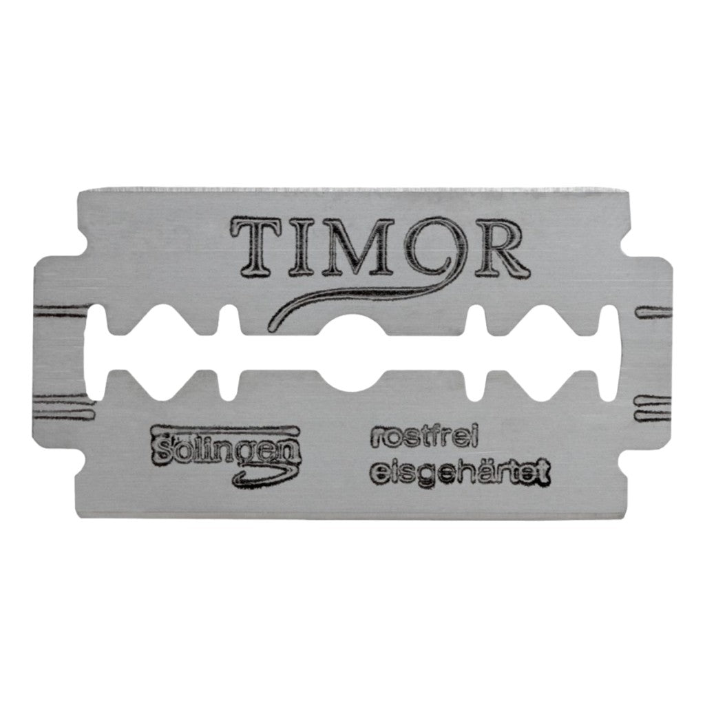 Metallic razor blade with 'TIMOR' branding on a white background