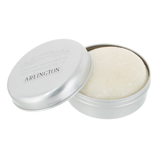 Silver container with solide shampoo bar inside, branded 'Arlington', on a white background