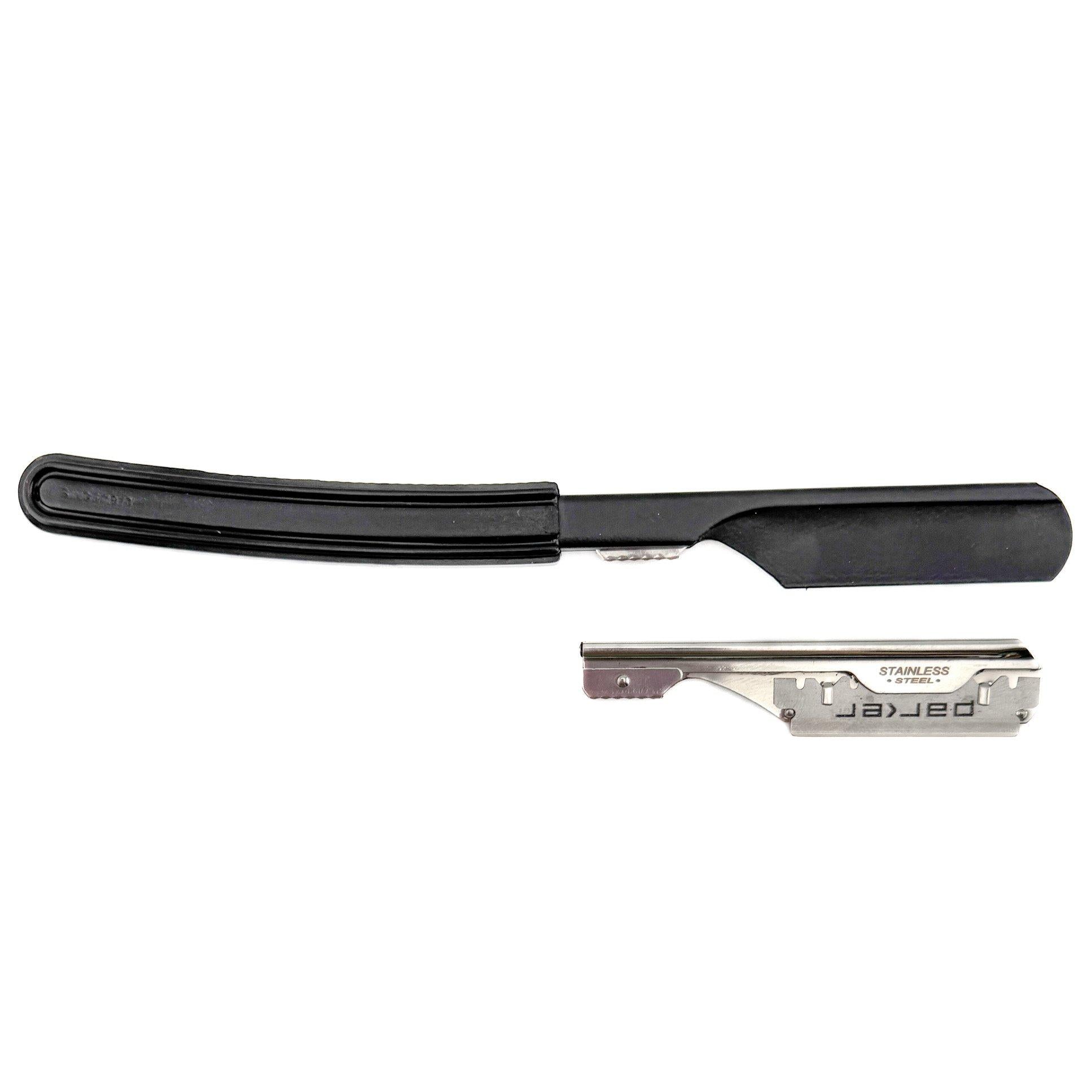 Black safety razor with a silver blade on a white background