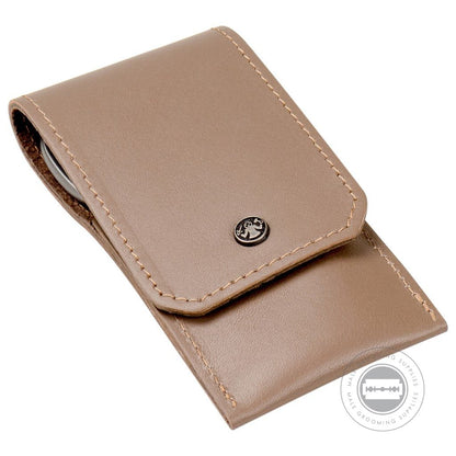 Dovo Taupe Leather Manicure Set closed with beige stitching and metal logo.