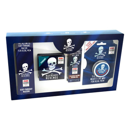 Close-up of The Bluebeards Revenge Hipster Kit in a sleek packaging, containing grooming essentials like beard oil, moustache wax, pomade, and a cut-throat razor.