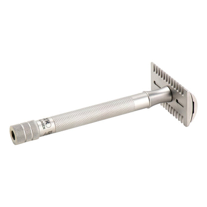 Underside angle of the Merkur 25 INOX showing the open comb teeth and satin handle.