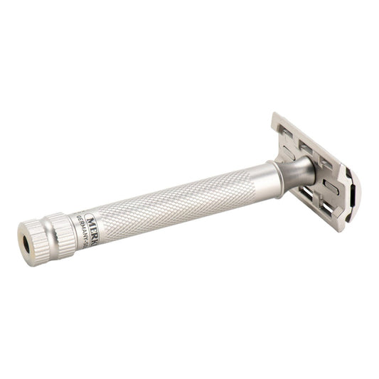 A silver stainless steel folding pocket knife shown on a plain white background, with the brand name 'MERKUR' visible on the handle.