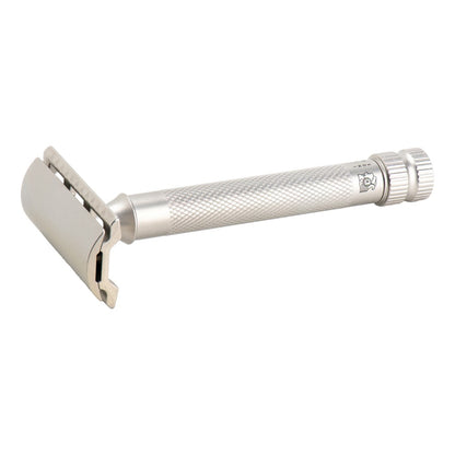 A stainless steel safety razor with a textured handle shown on a plain white background.