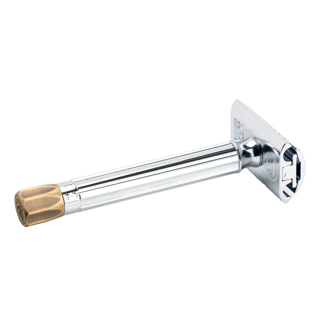 Underside angle of the Merkur 510 Progress with long chrome handle and brass knob.