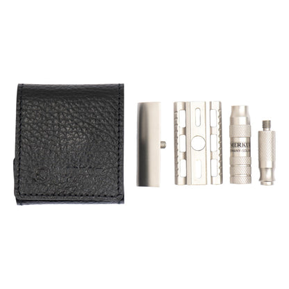 Disassembled Merkur 933 INOX travel razor components beside the black leather case