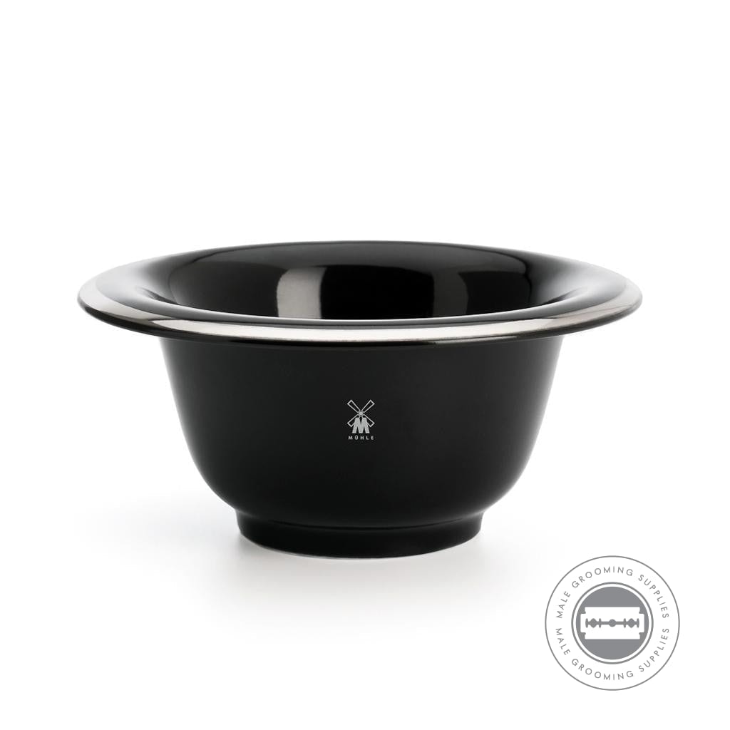 Side view of the Muhle Shaving Bowl, featuring sleek black porcelain with a platinum rim, perfect for whipping shaving lather.