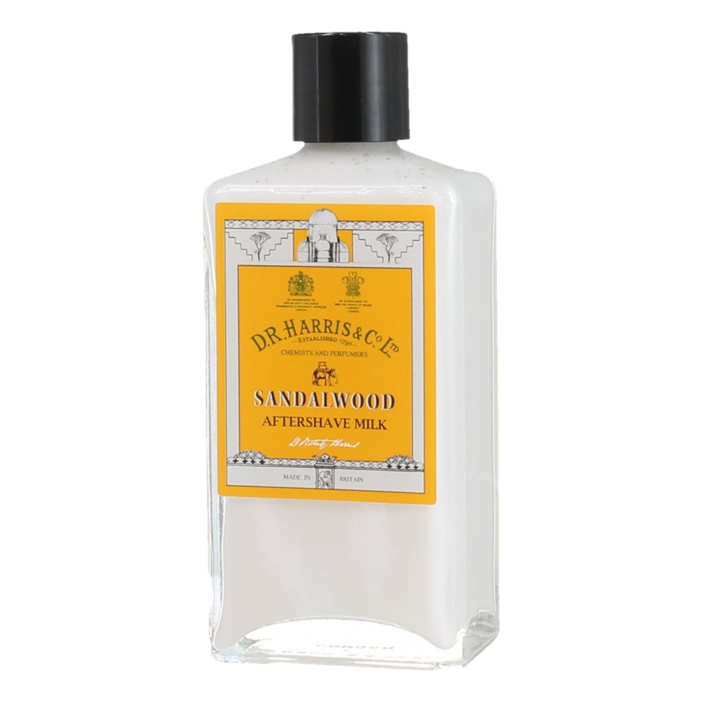 Bottle of Dr. Harris Sandalwood Aftershave Milk 100ml on a white background