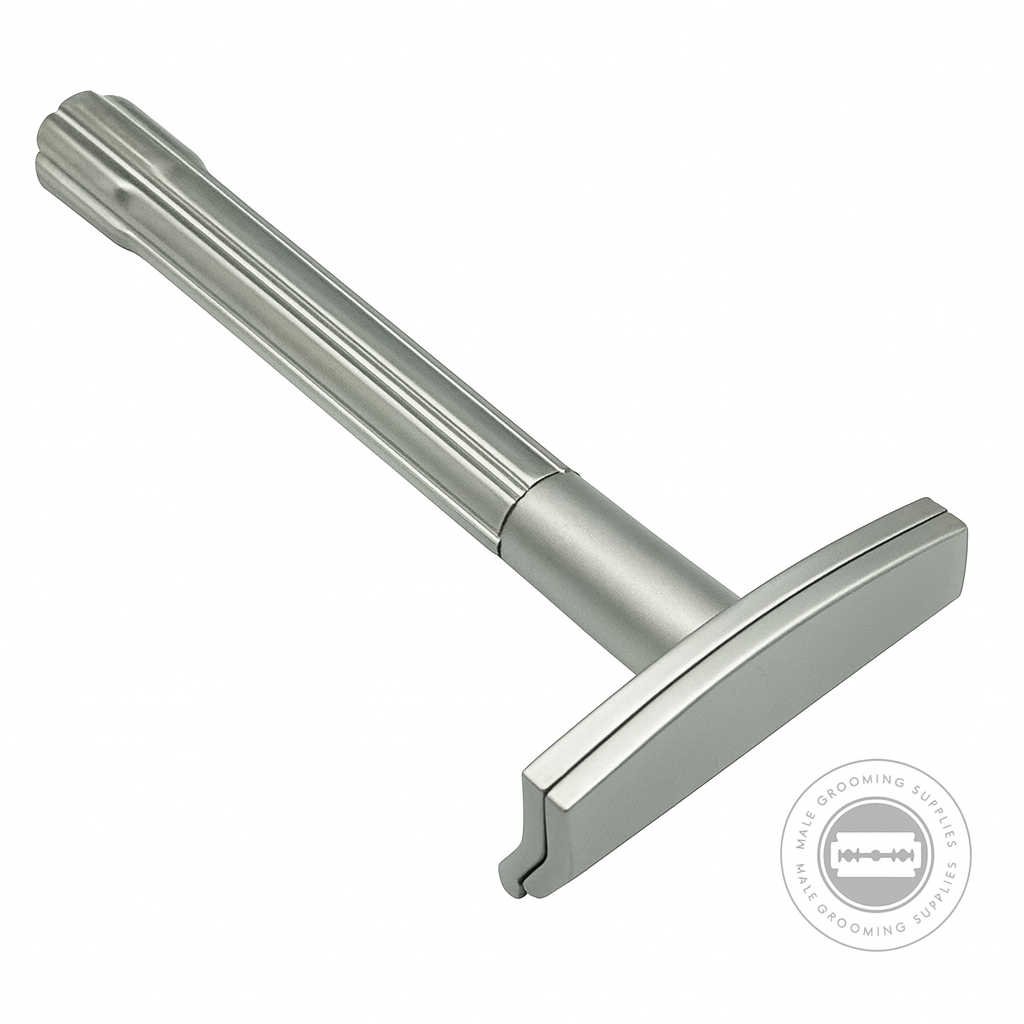 Silver safety razor on a white background