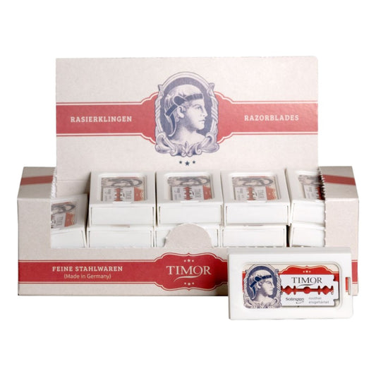 Display of Timor razor blades packaging on a white background