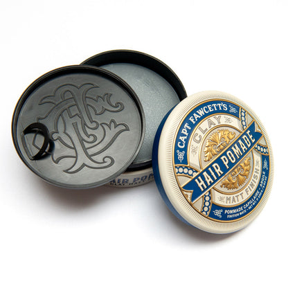 Capt Fawcett's Hair Pomade container with lid open on a white background